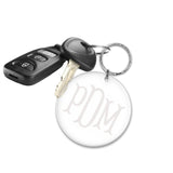 round acrylic keychain with monogram