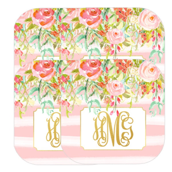 pink floral watercolor design on set of coasters with intial monograms