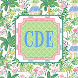 mahjong mat with 'CDE' monogram in a pink frame against a tropical patterned background.