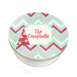 Christmas tree design on chevron pattern cookie tin with name imprinted in center